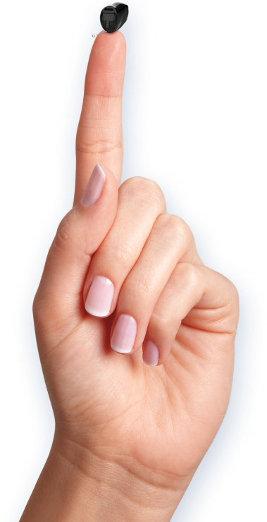 Mini-Hörgerät auf einer Hand